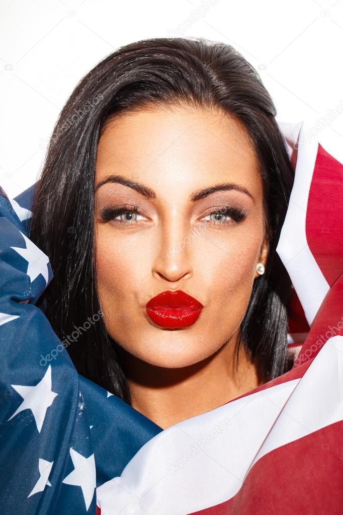 Sexy woman portrait covering with USA flag
