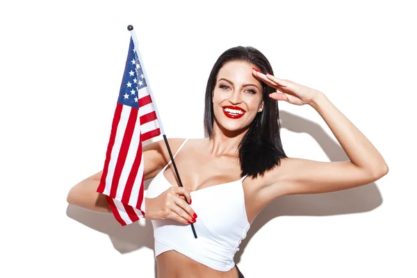 Sexy woman salute with usa flag Stock Picture
