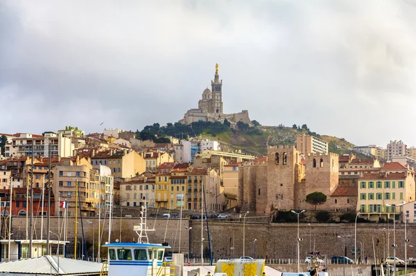 Notre-Dame de la Garde and Abbey of Saint Victor in Marseille - — Stock Photo, Image