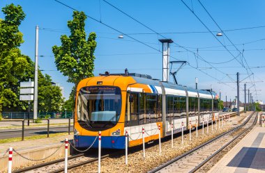 Tram at Theresienkrankenhaus station in Mannheim - Germany clipart