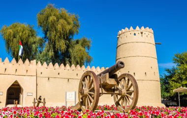Cannon in front of the Eastern Fort of Al Ain, UAE clipart