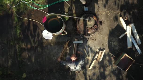 Aerial Top View Farmer Chopping Old Wooden Window Hatchet Fire — Stock Video