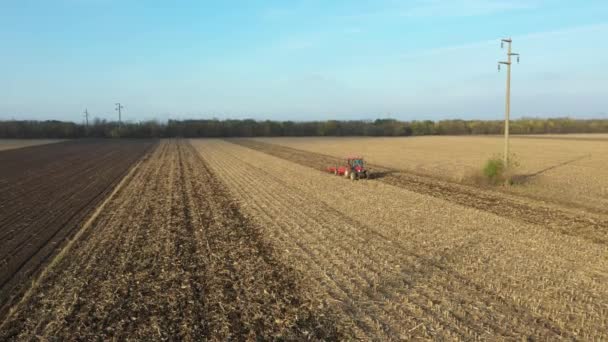 Dolly Move Shot Tractor Pulling Machine Harrowing Arable Field Preparing — Stock Video