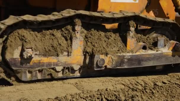 Närbild Bulldozer Underrede Push Utjämning Sand För Väg Grund Byggarbetsplatsen — Stockvideo