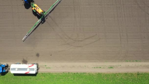 Top View Overhead View Tractor Spraying Big Endless Farmland Dragging — Stock Video