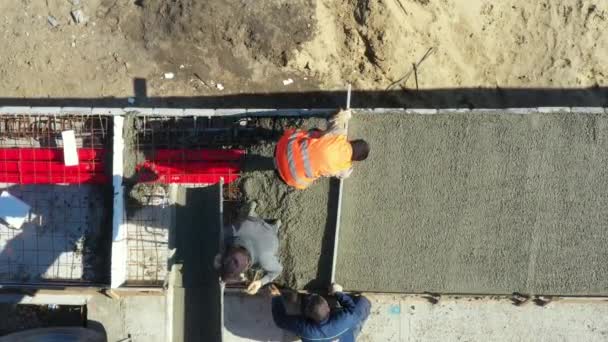 Top View Overhead Construction Workers Leveling Fresh Concrete Metal Lath — Stock Video