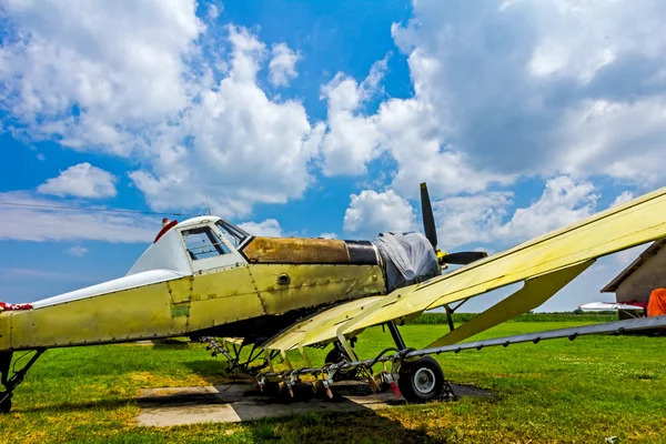 Crop duster airplane on airfield — Stock Photo, Image