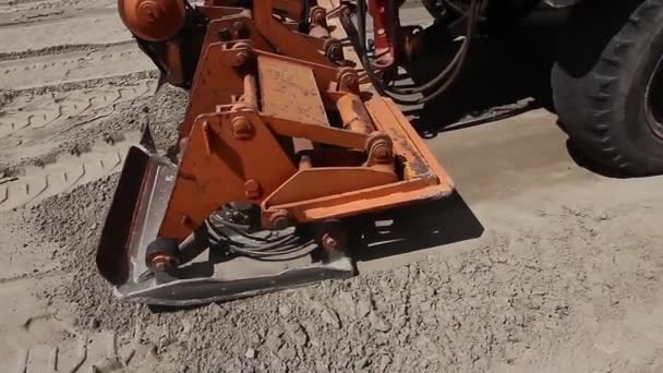 Close of plate compactor mounted on truck. — Stock Video