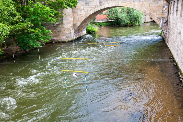 Town of Bamberg Canoe slalom s is a competitive sport with the aim to navigate a decked canoe or kayak through a course of hanging downstream or upstream gates on river rapids in the fastest time possible