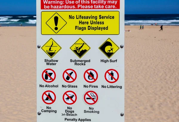 Warning Sign Beach Many Hazards — Stock Photo, Image