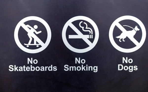 Warning Skateboarding Smoking Dogs — Stock Photo, Image