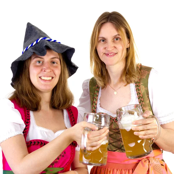 Mujeres en dirndl tintineo gafas —  Fotos de Stock