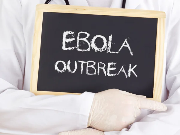 Doctor shows information: Ebola outbreak — Stock Photo, Image