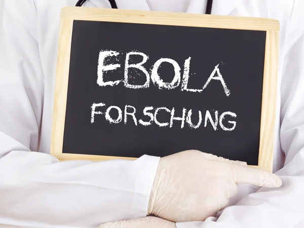 Doctor shows information: Ebola research in german — Stock Photo, Image