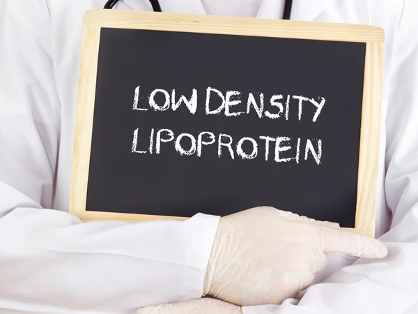 Doctor shows information: low density lipoprotein in german — Stock Photo, Image