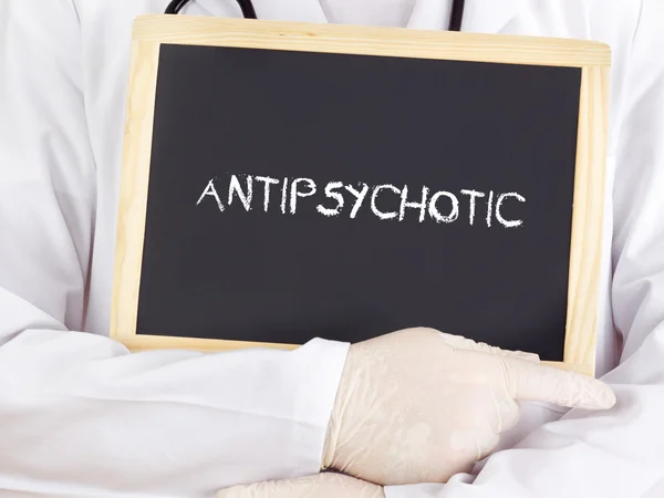 El médico muestra información: antipsicótico — Foto de Stock