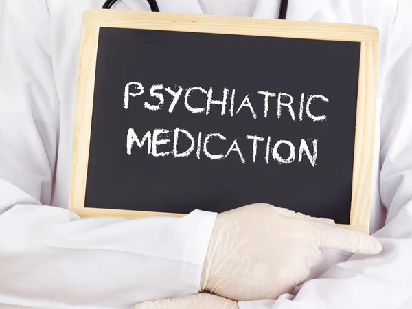 El médico muestra información: medicación psiquiátrica — Foto de Stock