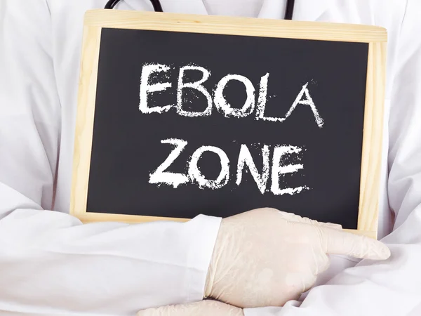 Lääkäri näyttää tiedot: Ebola vyöhyke — kuvapankkivalokuva