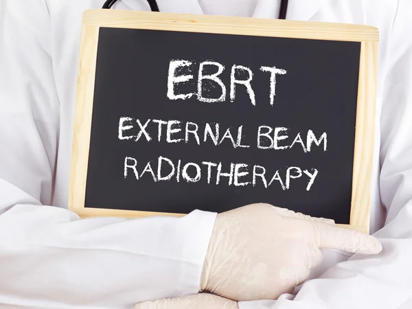 Doctor shows information: EBRT external beam radiotherapy — Stock Photo, Image