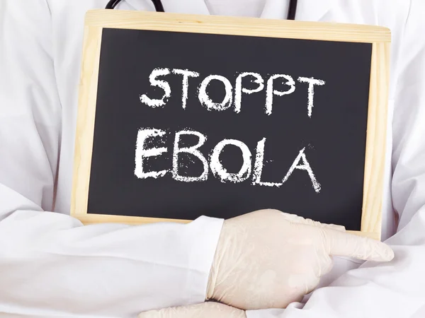 Doctor shows information: stop Ebola in german language — Stock Photo, Image