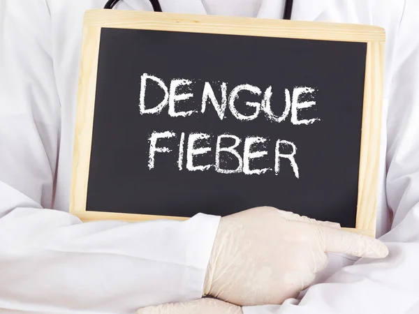 Läkare visar information: denguefeber i tyska — Stockfoto