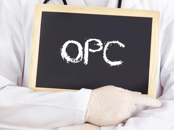 Doctor shows information on blackboard: OPC — Stock Photo, Image