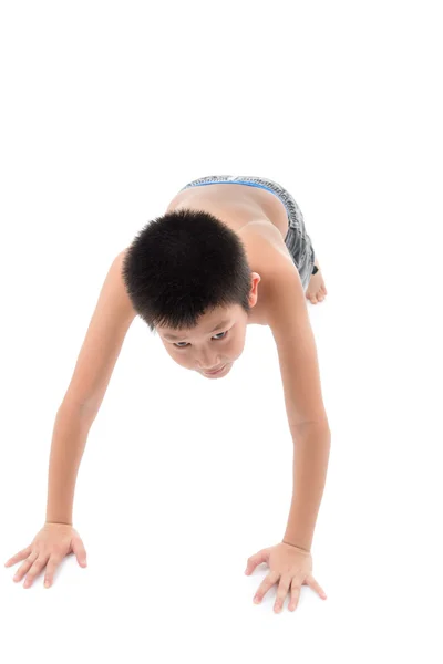 Asian boy doing plank exercise — Stock Photo, Image