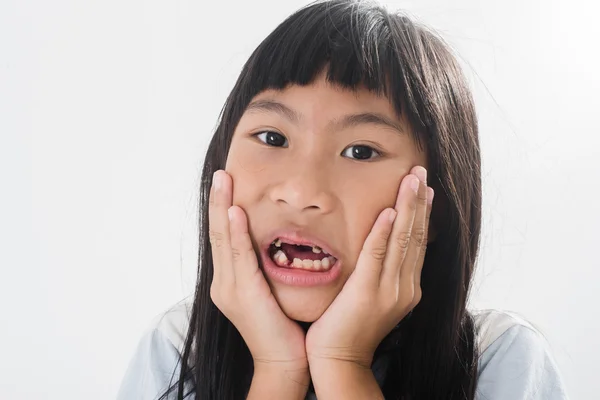 Asian child has lost the baby tooth — Stock Photo, Image