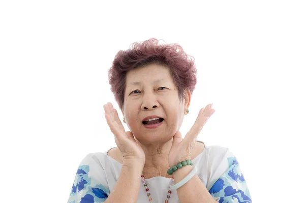 Portrait of a shocked elderly female isolated against white back — Stock Photo, Image