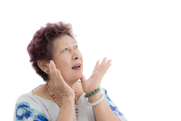 Portrait of a shocked elderly female isolated against white back — Stock Photo, Image