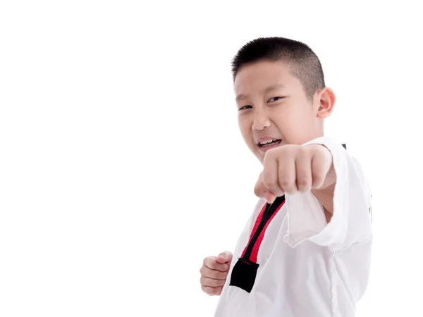 Jeune garçon en uniforme de taekwondo — Photo