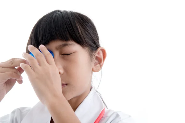 First Aid flush eyes with medicine washing white background — Stock fotografie