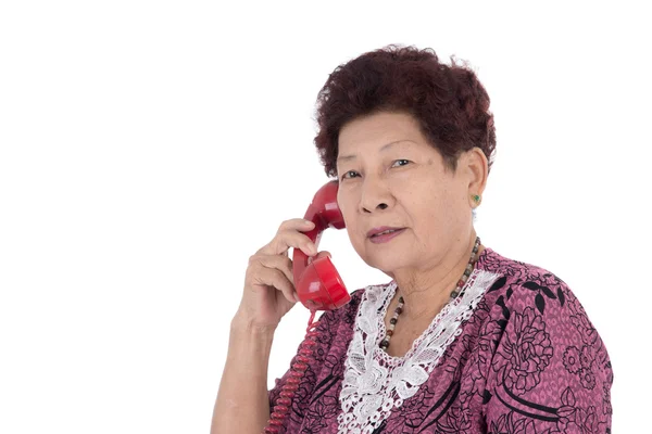 Starší žena mluvila na telefonu — Stock fotografie