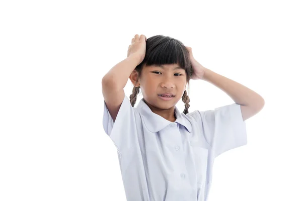 Asiatiska skolflickor i uniform kliar huvudet — Stockfoto