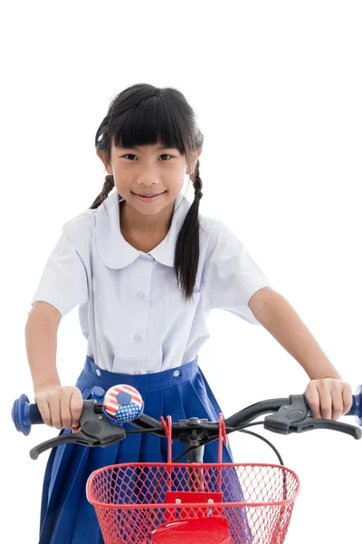 Asian kids cute girl in student's uniform riding bicycle to scho — Stock Photo, Image