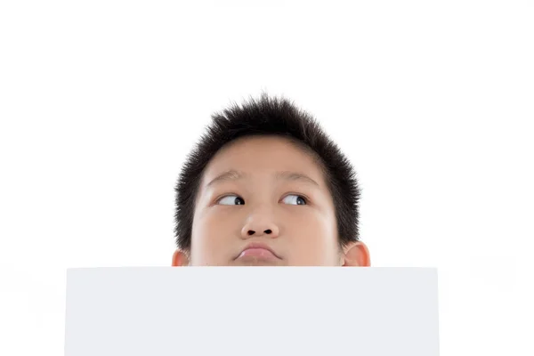 Asian boy holding behind white board — Stock Photo, Image