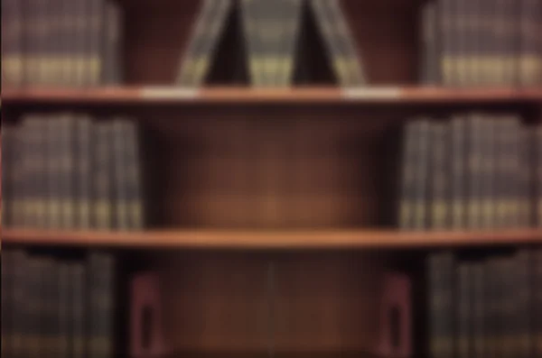 Blurry background vintage book shelf — Stock Photo, Image