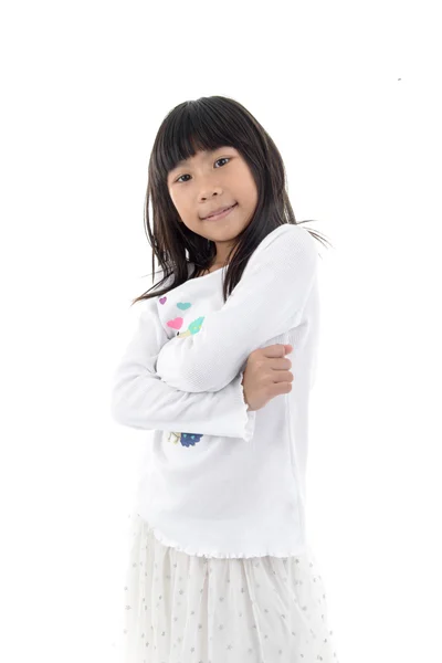 分離した白い背景の上に立っているかわいいアジアの女の子 — ストック写真