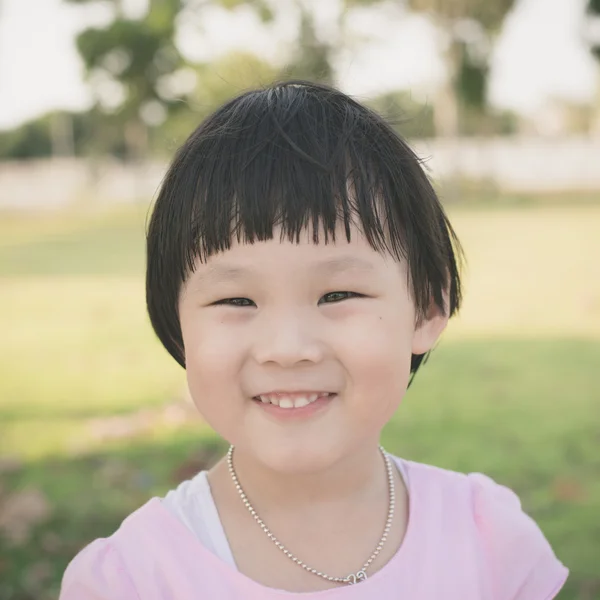 Happy Asian girl outdoor. — Stock Photo, Image