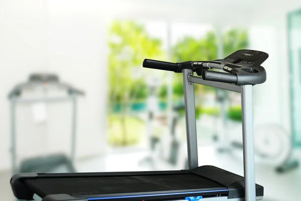Fitness center with traineger equipments — Stock Photo, Image