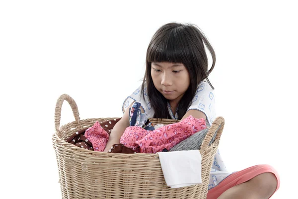 Child holding laundry basket on white — Stock Photo, Image