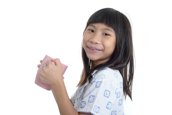 Beautiful hispanic girl wearing pajamas and holding a cup of mil — Stock Photo, Image