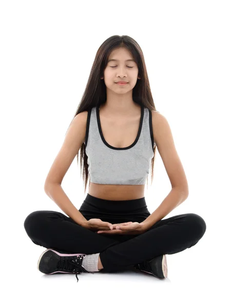 Menina fazendo meditação no branco . — Fotografia de Stock