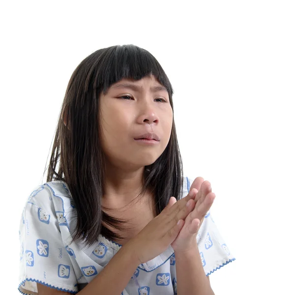 Close up Asian girl in pajamas crying on white. — Stock Photo, Image