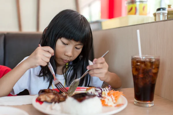 Asian girl having her lunch — Stock Photo, Image