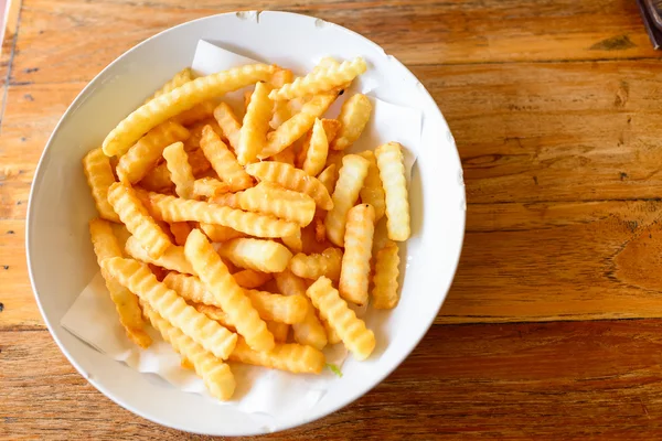 Pommes frites nærmer seg over tre – stockfoto