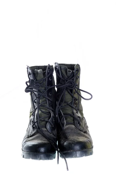 Old and dusty combat boots isolated on white. — Stock Photo, Image