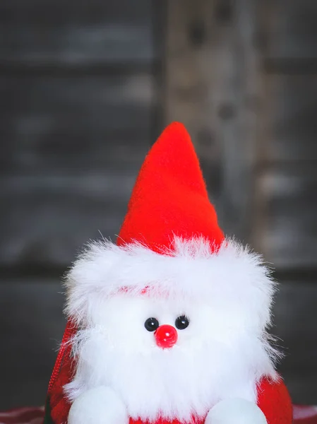 Santa doll with wooden background. — Stock Photo, Image