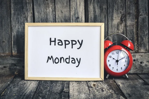 Happy Monday messae on white board and red retro clock  by woode — Stock Photo, Image
