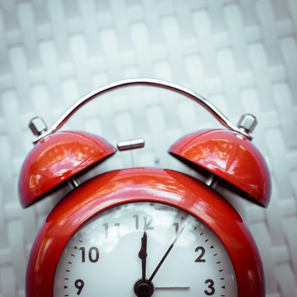 Retro alarm clock on  texture background. — Stock Photo, Image